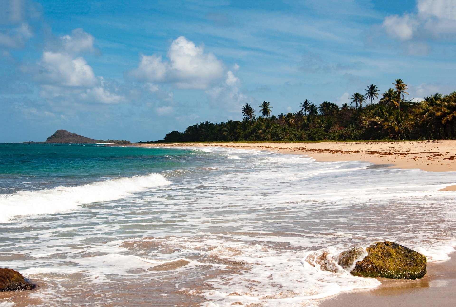 Grenada is known for lush forests and beautiful beaches. Surely a tempting investment destination!